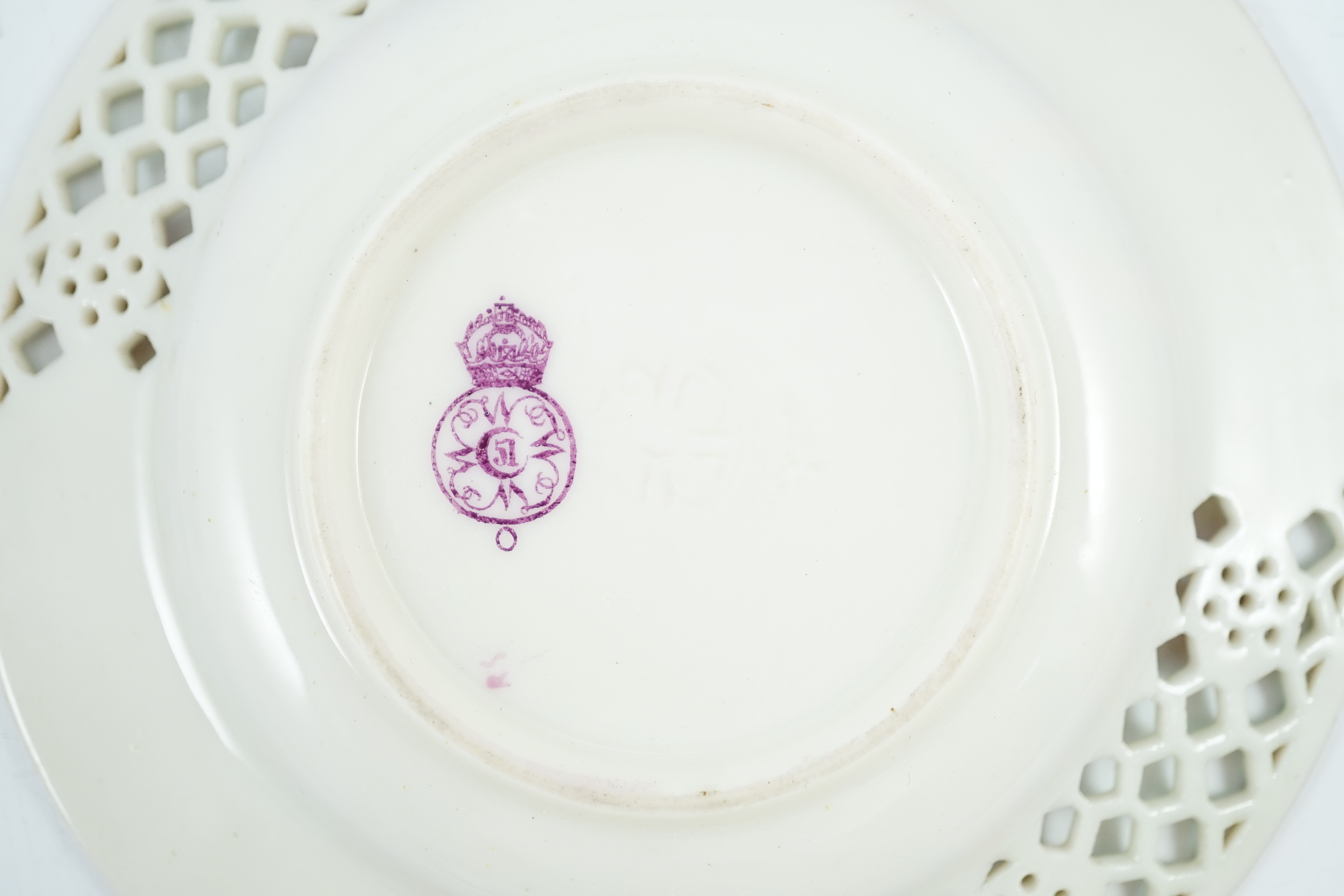 A Royal Worcester reticulated miniature cabinet cup and saucer, late 19th century